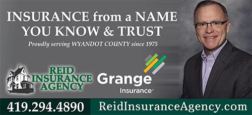 Reid Banner - Portrait of Dan Reid on the Right of a Banner the Agency and Grange Logo Being Displayed Along With Contact Info
